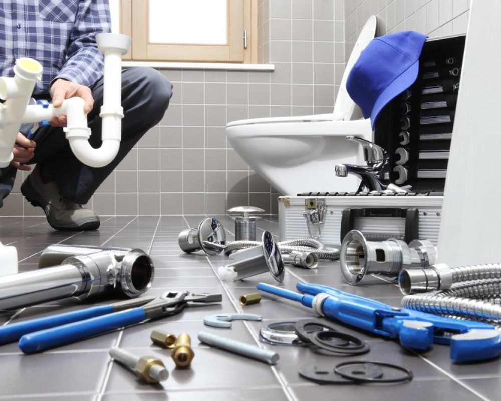 Plumber,At,Work,In,A,Bathroom,,Plumbing,Repair,Service,,Assemble